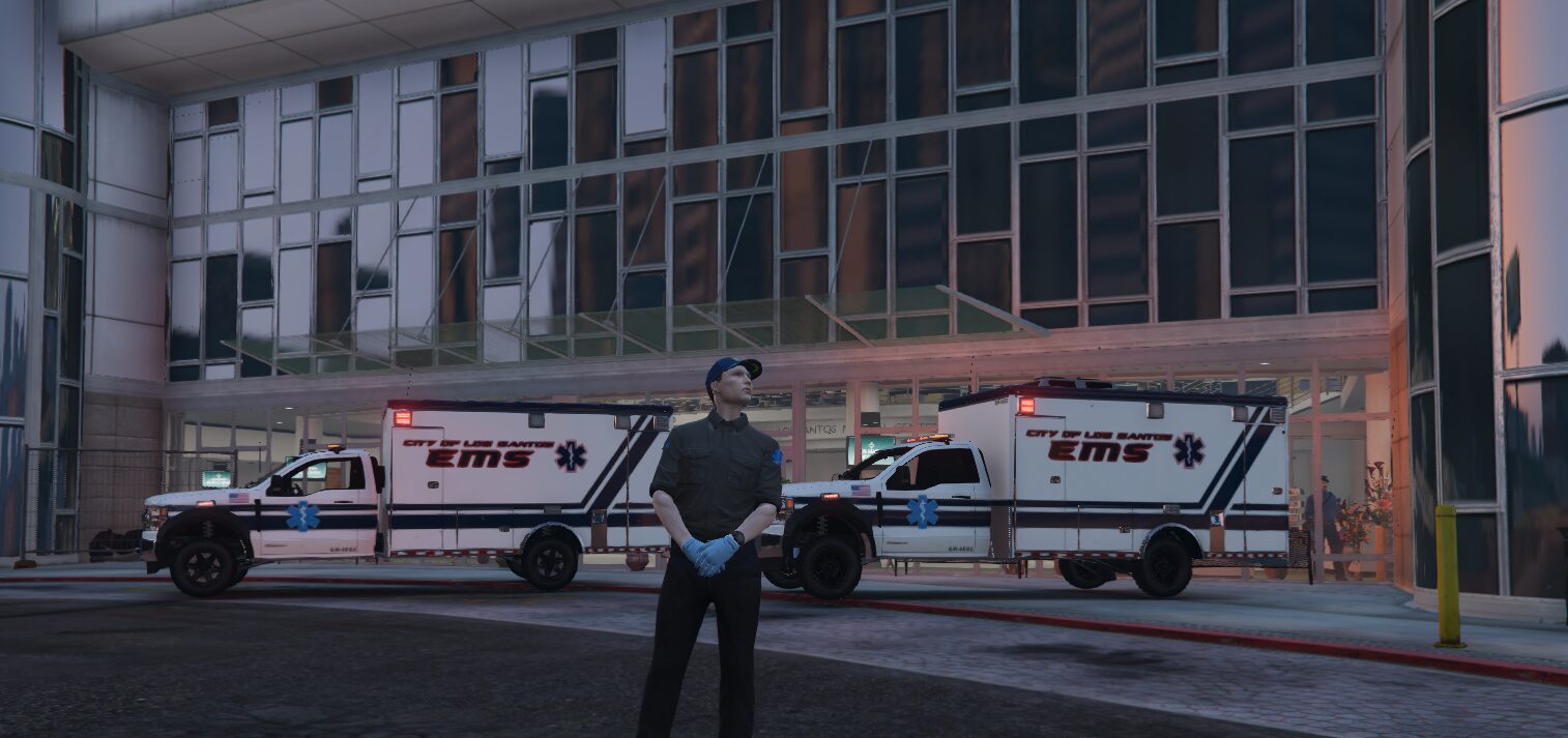 Un ambulancier devant l’hôpital et ses ambulances